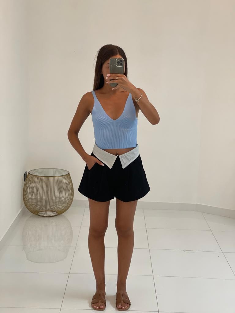 Top scollo V