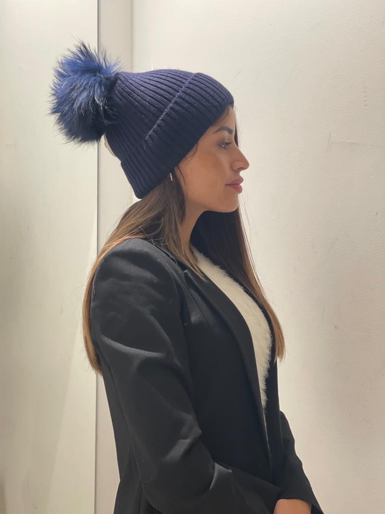 Cappello con pompom