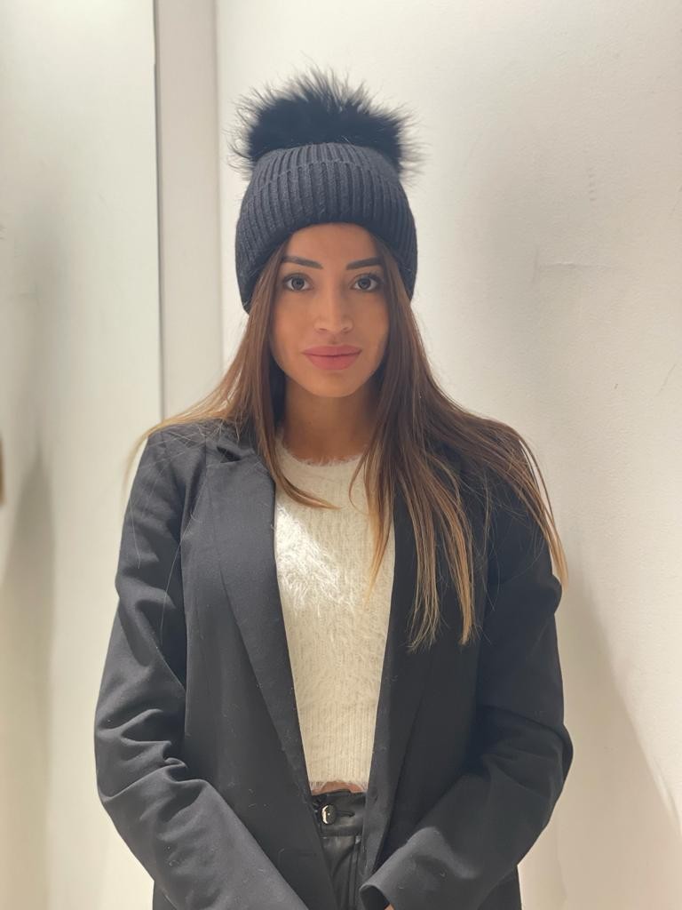 Cappello con pompom