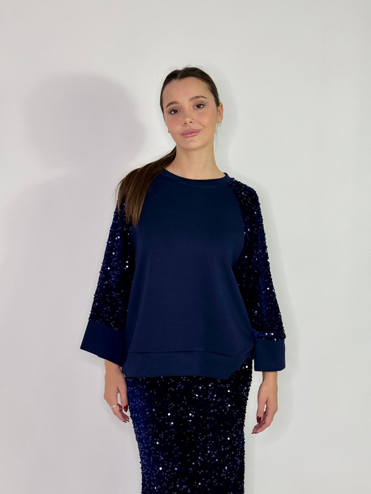 Maglia con manico in paillettes