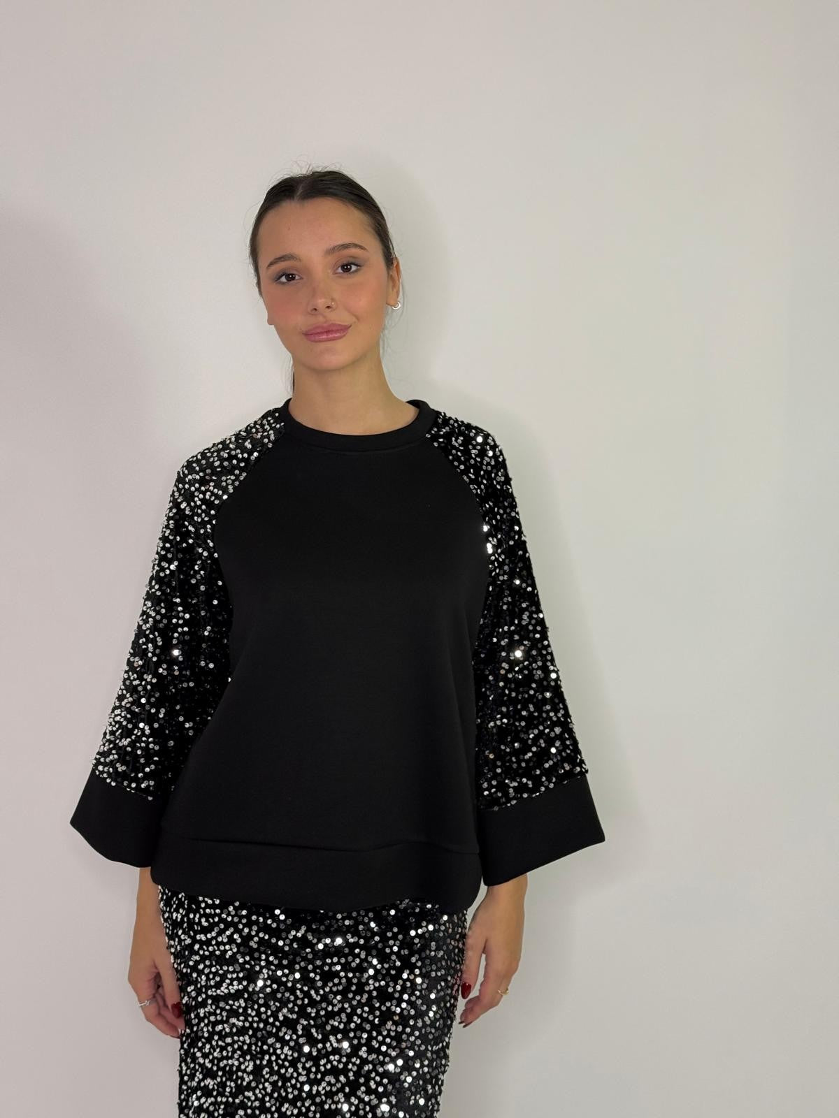 Maglia con manico in paillettes