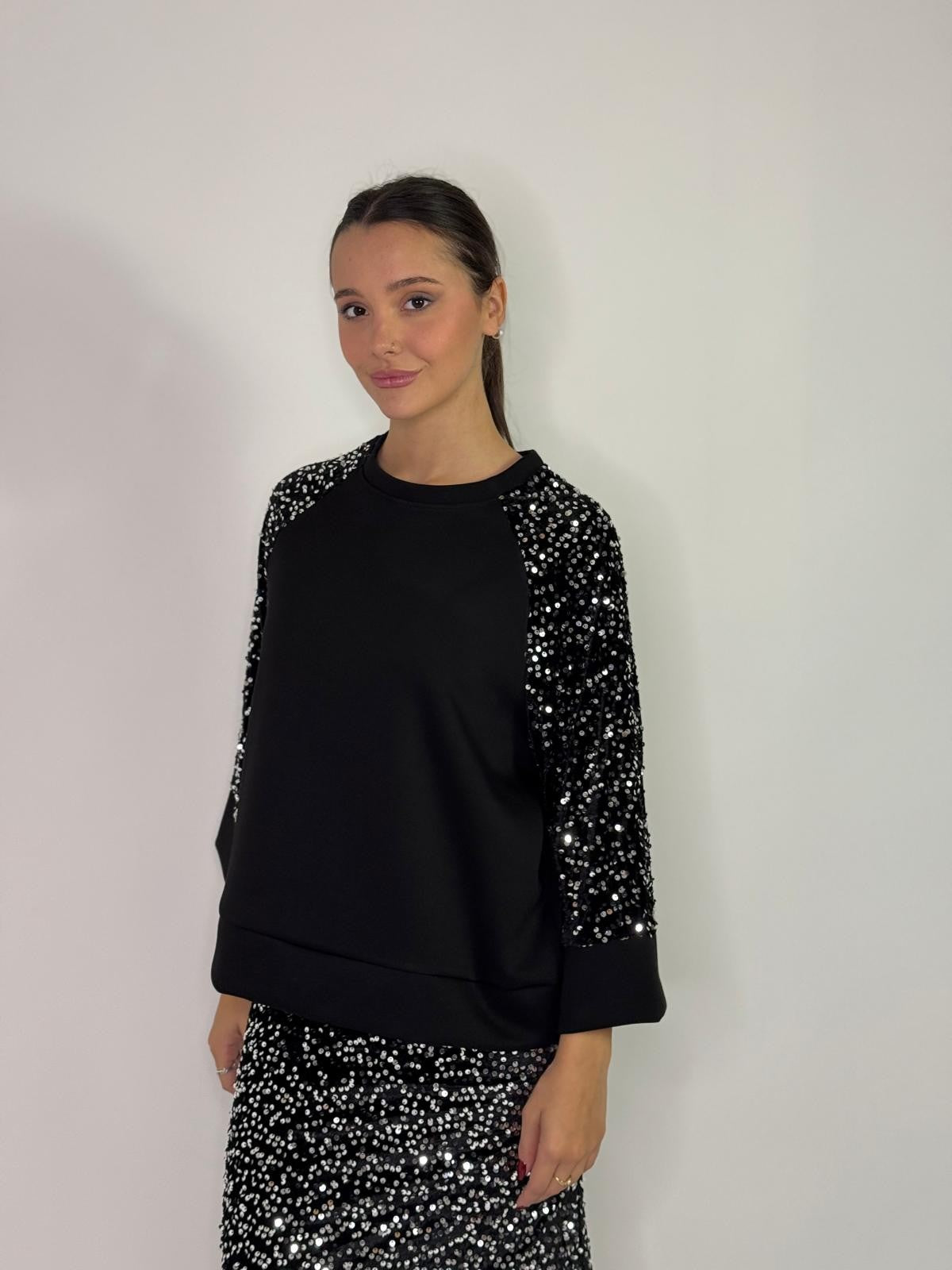 Maglia con manico in paillettes