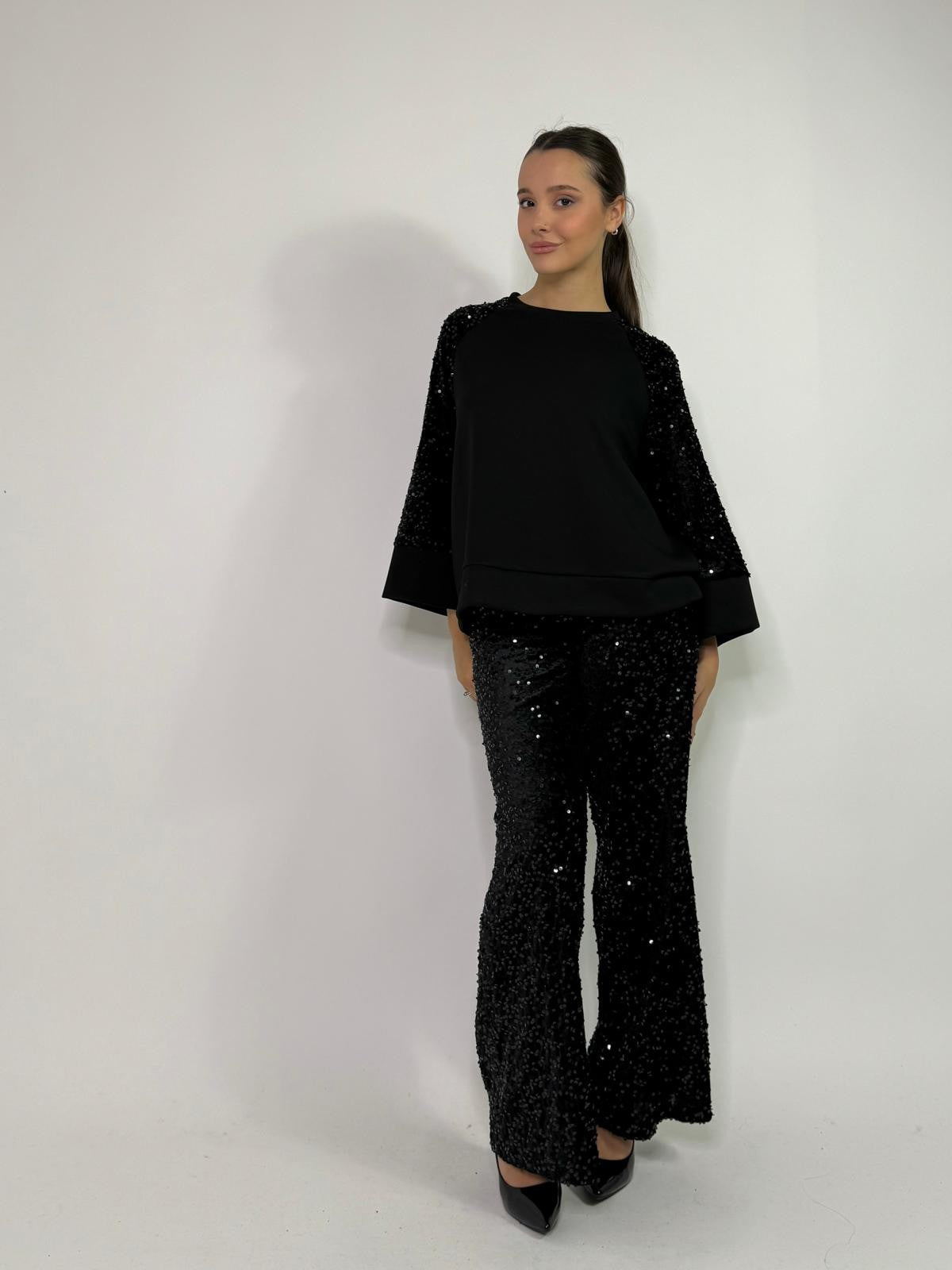 Maglia con manico in paillettes
