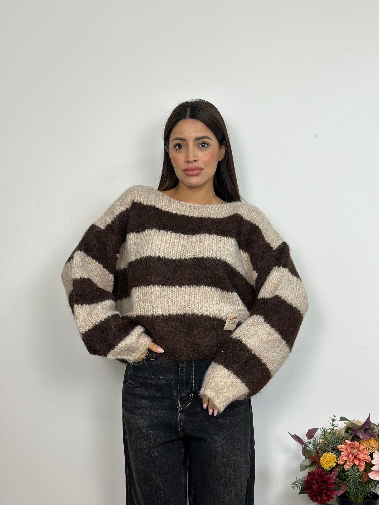 Maglione a righe con spalle cadenti