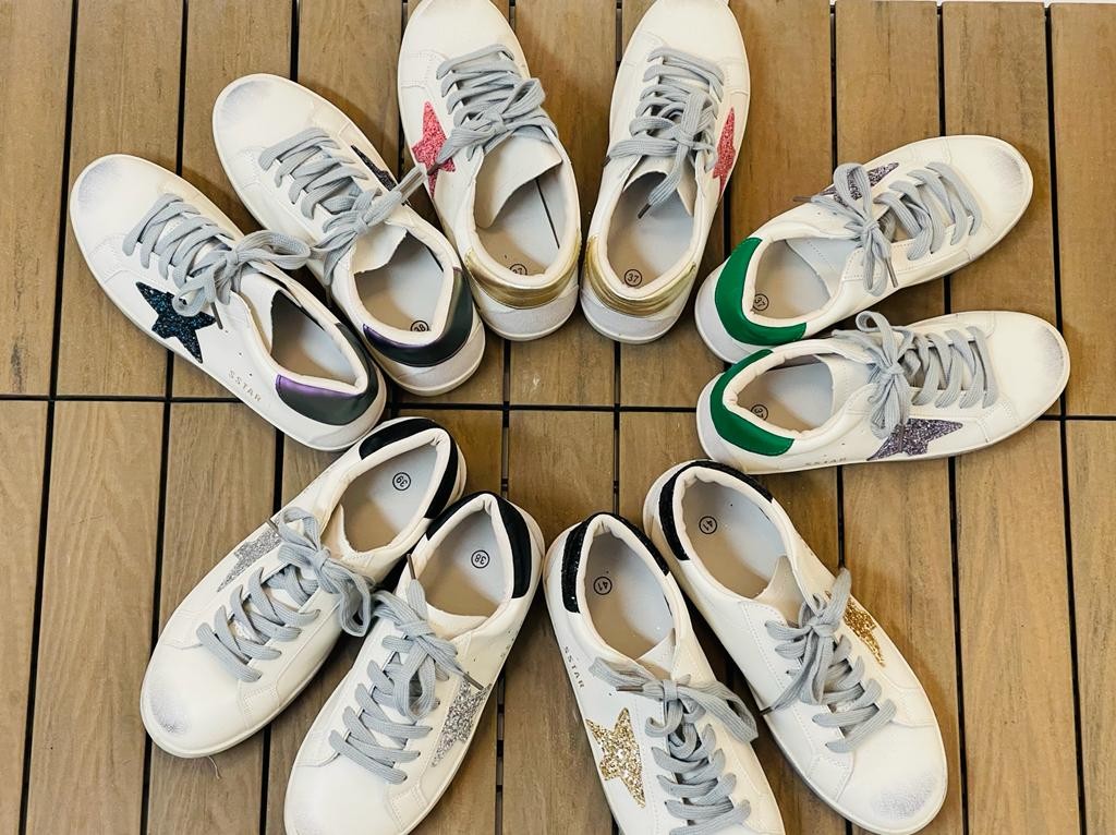 Sneakers con stella brillantinata