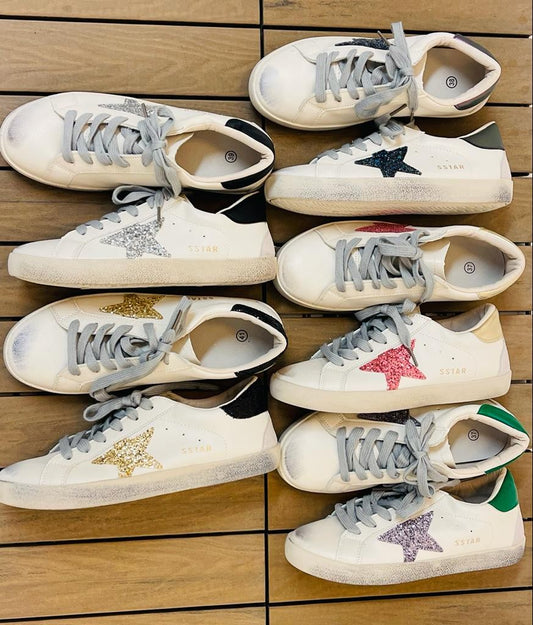 Sneakers con stella brillantinata