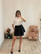 Camicia con manica corta a sbuffo