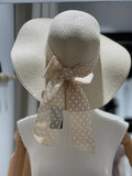 Cappello in paglia con fiocco a pois
