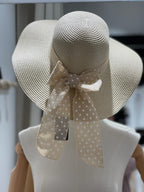 Cappello in paglia con fiocco a pois