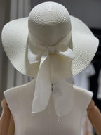 Cappello in paglia con fiocco
