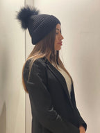 Cappello con pompom